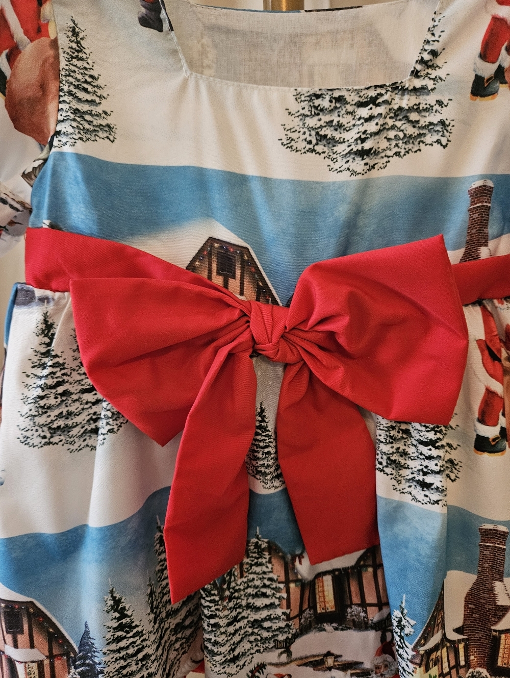Santa’s North Pole Scene Red & White Dress 🎅🎄 Big Bow Holiday Charm - Picture 3 of 4